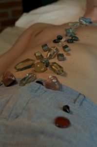 Crystal Grid Body Healing by Woodlights Woudlicht - Red Jasper, Garnet, Carnelian, Citrine, Rutile Quartz, Pyrite, Imperial Topaz, Emerald, Morganite, Aventurine, Turquoise, Aquamarine and Smithsonite on the body of a most beautiful soul
